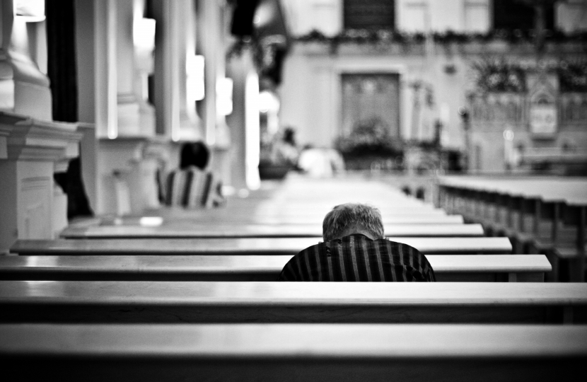 People praying in church
