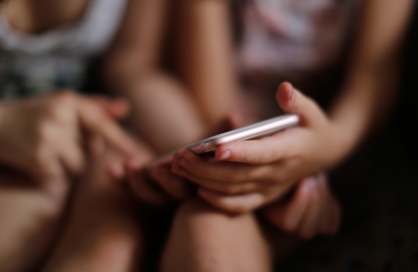 Children using a smartphone
