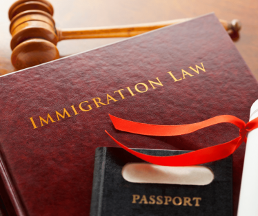 File and passport illustrating immigration law